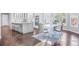 Spacious kitchen and dining area with a large island and seating at 255 Northland Ridge Trl, Atlanta, GA 30342