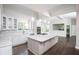 Bright and airy kitchen featuring a large center island and modern appliances at 255 Northland Ridge Trl, Atlanta, GA 30342