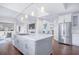Bright and airy kitchen featuring a large center island, stainless steel appliances at 255 Northland Ridge Trl, Atlanta, GA 30342