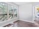 Bright living room with hardwood floors and a view of the surrounding trees at 255 Northland Ridge Trl, Atlanta, GA 30342