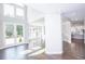 Open concept living room features hardwood floors and recessed lighting at 255 Northland Ridge Trl, Atlanta, GA 30342