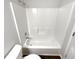 Bathroom featuring a bathtub and shower combination with white fixtures at 3766 Windy Hill Se Dr, Conyers, GA 30013