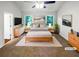 Serene main bedroom with ample natural light and stylish, contemporary furniture at 3766 Windy Hill Se Dr, Conyers, GA 30013