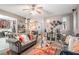 Spacious living room with dual couches, neutral walls, and decorative mirrors at 6664 Saint Jude Dr, Fairburn, GA 30213