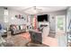Elegant living room with stylish decor, plush seating, and plenty of natural light at 6664 Saint Jude Dr, Fairburn, GA 30213