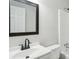 Clean bathroom showcasing a sleek vanity, mirror, and tub-shower combo at 100 Davis Mill N Rd, Dallas, GA 30157