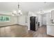Modern kitchen featuring stainless appliances, white cabinetry, and updated countertops at 100 Davis Mill N Rd, Dallas, GA 30157