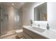 Bathroom featuring walk in shower, sleek vanity and updated fixtures at 3117 W Roxboro Ne Rd, Atlanta, GA 30324