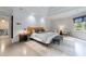 Spacious bedroom with a decorative tray ceiling, and contemporary decor at 3117 W Roxboro Ne Rd, Atlanta, GA 30324