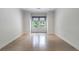 Empty bedroom with natural light showcasing neutral paint and hardwood floors at 3117 W Roxboro Ne Rd, Atlanta, GA 30324
