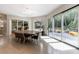 Bright dining area with large sliding doors offering access to the outdoor deck at 3117 W Roxboro Ne Rd, Atlanta, GA 30324