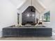 Spacious living room with high ceilings, a fireplace, and ample seating at 3117 W Roxboro Ne Rd, Atlanta, GA 30324