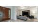 Bright entryway leading to a modern living room with stylish furniture and coffered ceilings at 3117 W Roxboro Ne Rd, Atlanta, GA 30324