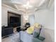 Contemporary living room with stylish furniture, coffered ceilings, modern TV, and open layout at 3117 W Roxboro Ne Rd, Atlanta, GA 30324