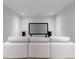 Home theater boasts large screen, comfortable seating, and great acoustics at 3117 W Roxboro Ne Rd, Atlanta, GA 30324