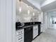 Convenient wet bar with black granite countertop and undermount sink at 3117 W Roxboro Ne Rd, Atlanta, GA 30324