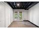 Finished basement with closet space and walkout to the exterior at 3214 Woodleaf Ct, Marietta, GA 30062