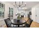 Cozy breakfast nook offering a sunny view of the outdoors, adjacent to the updated kitchen at 3214 Woodleaf Ct, Marietta, GA 30062