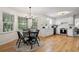 Bright breakfast nook featuring large windows and adjacent updated kitchen at 3214 Woodleaf Ct, Marietta, GA 30062