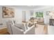 Inviting living room with modern furnishings, ample natural light, and a soothing color palette, ideal for comfortable living at 3214 Woodleaf Ct, Marietta, GA 30062