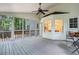 Relaxing screened porch with fan, overlooking the greenery at 3214 Woodleaf Ct, Marietta, GA 30062