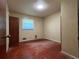 Bedroom featuring hardwood floors, neutral walls and a large window at 4048 Emerald Lake Dr, Decatur, GA 30035