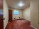 Simple bedroom with hardwood floors, cream-colored walls, and natural light at 4048 Emerald Lake Dr, Decatur, GA 30035