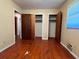 Bedroom featuring hardwood floors, neutral walls and dual closets at 4048 Emerald Lake Dr, Decatur, GA 30035