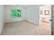 This bedroom features a bright window and ensuite bathroom entrance at 610 Golden Meadows Ln, Suwanee, GA 30024