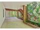 Covered back patio offers a tranquil setting, perfect for relaxing in a private outdoor retreat at 610 Golden Meadows Ln, Suwanee, GA 30024