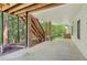 Comfortable, covered back patio is perfect for entertaining or enjoying peaceful outdoor living at 610 Golden Meadows Ln, Suwanee, GA 30024