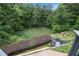 Backyard pond view highlighting natural surroundings and backyard features, with lush greenery at 1640 Settindown Dr, Roswell, GA 30075