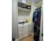 Functional closet with built-in shelves and drawers at 1640 Settindown Dr, Roswell, GA 30075