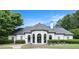 Beautiful modern home with stone accents and manicured landscaping at 1640 Settindown Dr, Roswell, GA 30075