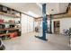 Spacious garage featuring car lifts, work benches, and ample storage, perfect for automotive enthusiasts at 1640 Settindown Dr, Roswell, GA 30075