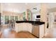 Bright kitchen with granite counters, stainless appliances, and an eat-in area perfect for Gathering dining at 1640 Settindown Dr, Roswell, GA 30075