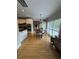 Cozy kitchen nook with hardwood floors, a charming table and chairs, and plenty of natural light at 1640 Settindown Dr, Roswell, GA 30075