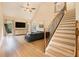 Inviting living area with hardwood floors, a comfortable sofa, tall ceilings, and lots of natural light at 1640 Settindown Dr, Roswell, GA 30075