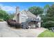 Charming two-story home with landscaped yard, back porch, and basement garage at 1640 Settindown Dr, Roswell, GA 30075