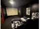 The ultimate theater room experience with a large projection screen, comfortable seating, and blackout capability at 1640 Settindown Dr, Roswell, GA 30075