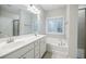 Bathroom with double vanity, soaking tub and shower at 2464 Georgetown Ave, Atlanta, GA 30345