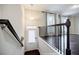 Inviting entryway with dark wood floors, staircase, and natural light from the window at 2464 Georgetown Ave, Atlanta, GA 30345