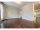 Bright living room featuring hardwood floors, crown molding and ample natural light at 2464 Georgetown Ave, Atlanta, GA 30345