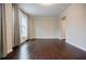 Bright living room with gleaming hardwood floors and natural light at 2464 Georgetown Ave, Atlanta, GA 30345