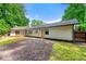 Well-maintained backyard with a deck and mature trees at 2991 Black Bear Se Dr, Marietta, GA 30067