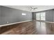 Spacious bedroom featuring hardwood floors, recessed lighting, and large windows providing ample natural light at 2991 Black Bear Se Dr, Marietta, GA 30067
