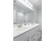 Bathroom featuring a double sink vanity and a large mirror at 807 Parker Pass, Peachtree City, GA 30269