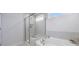 Modern bathroom with a soaking tub and glass-enclosed shower at 807 Parker Pass, Peachtree City, GA 30269