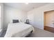 Cozy bedroom with neutral colors, comfortable bedding, and ample natural light at 807 Parker Pass, Peachtree City, GA 30269