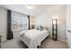 Bedroom featuring a window, neutral walls, and carpet at 807 Parker Pass, Peachtree City, GA 30269